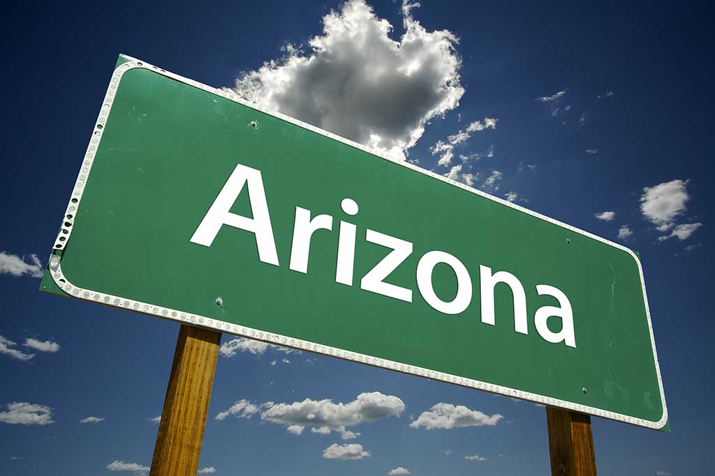 Arizona Road Sign with dramatic clouds and sky. Concept of Arizona Rapid Detox Centers
