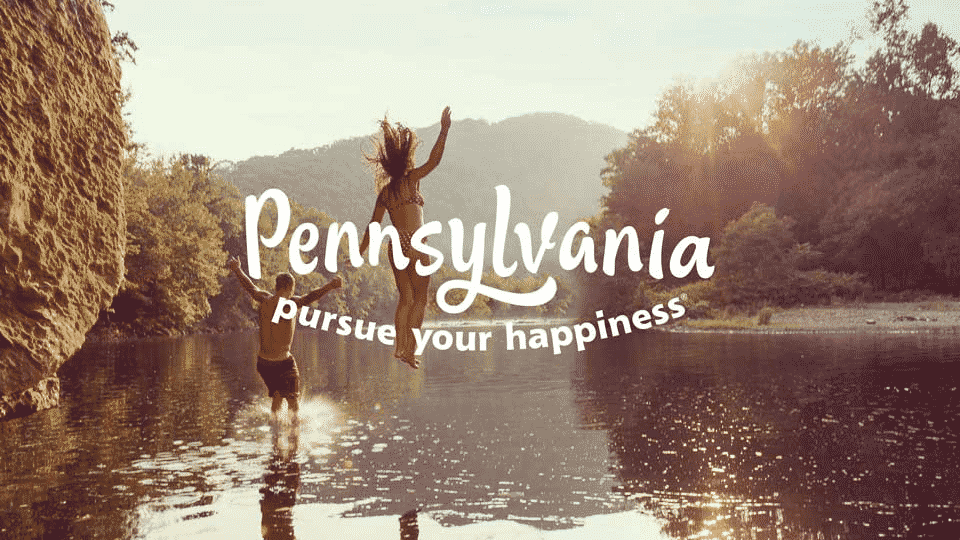 Pennsylvania pursue your happiness written on top image of man and women falling into a pond feet first at sunset. Representing Rapid Detox in Pennsylvania page