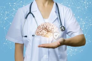 Doctor shows protected human brain on a blue background the idea of protecting brain health and preventing CNS depression.