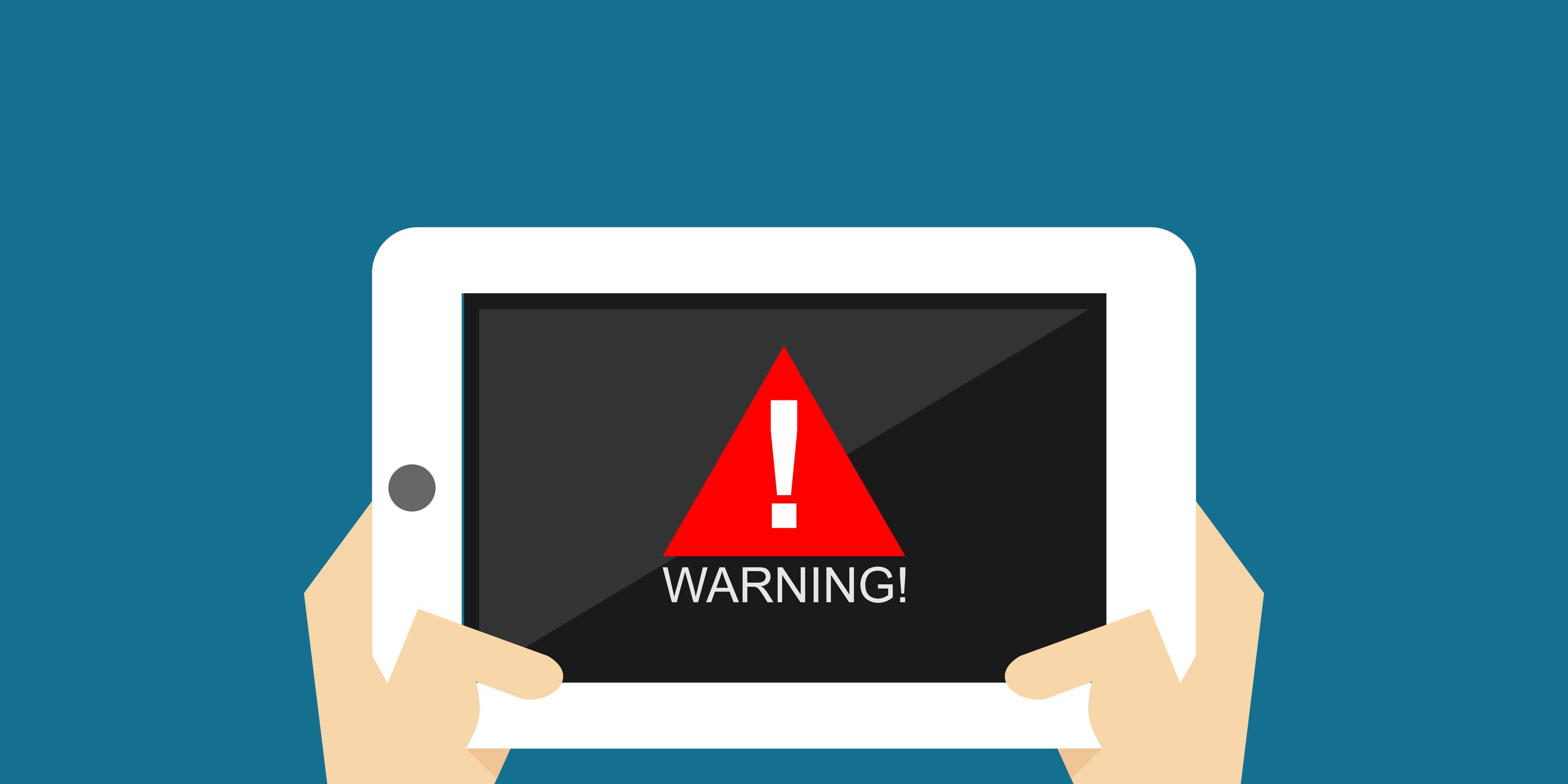 Drawing of hands holding ipad with warning sign to illustrate ultram warnings