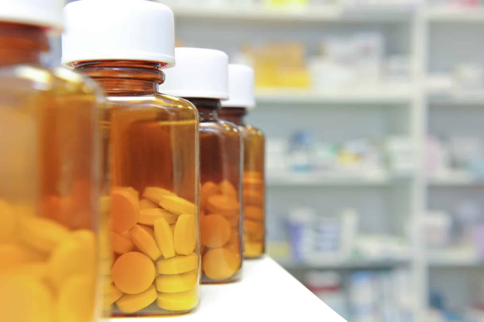 Shelves with pills in bottles
