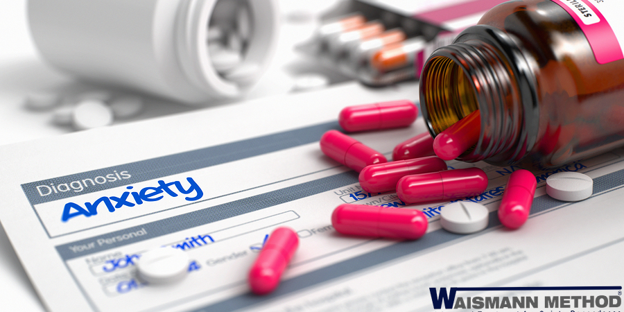 pink and white pills on paper with anxiety written and a waismann method logo. Illustration for anxiety can lead to drug addiction