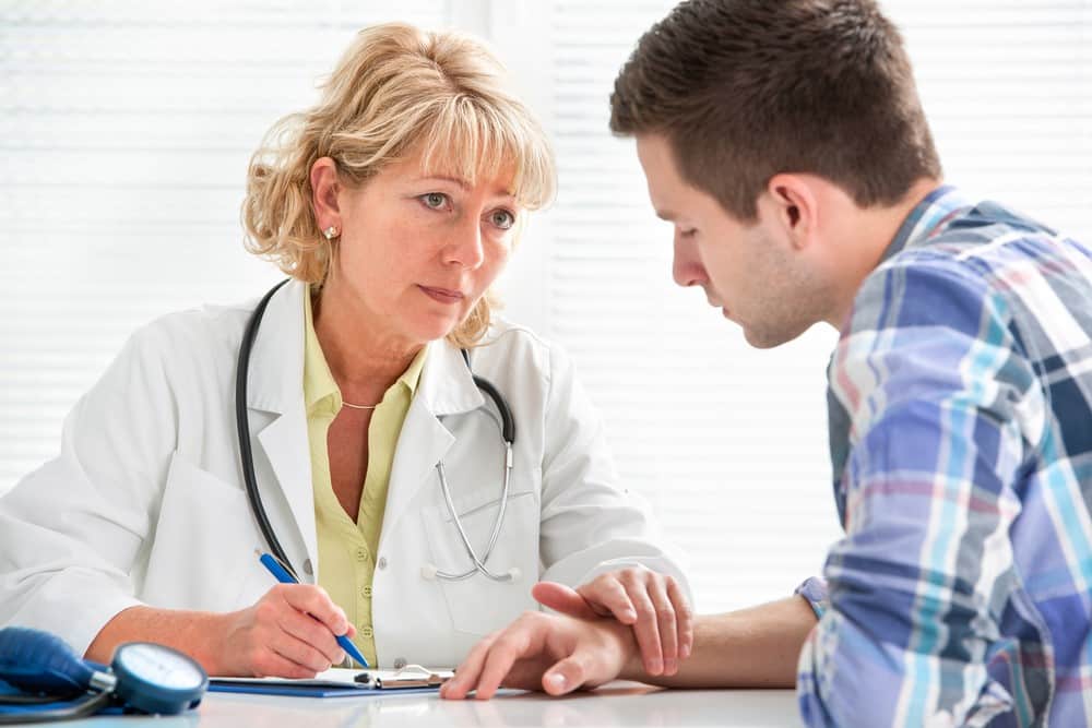 Female hands holding prescription drugs