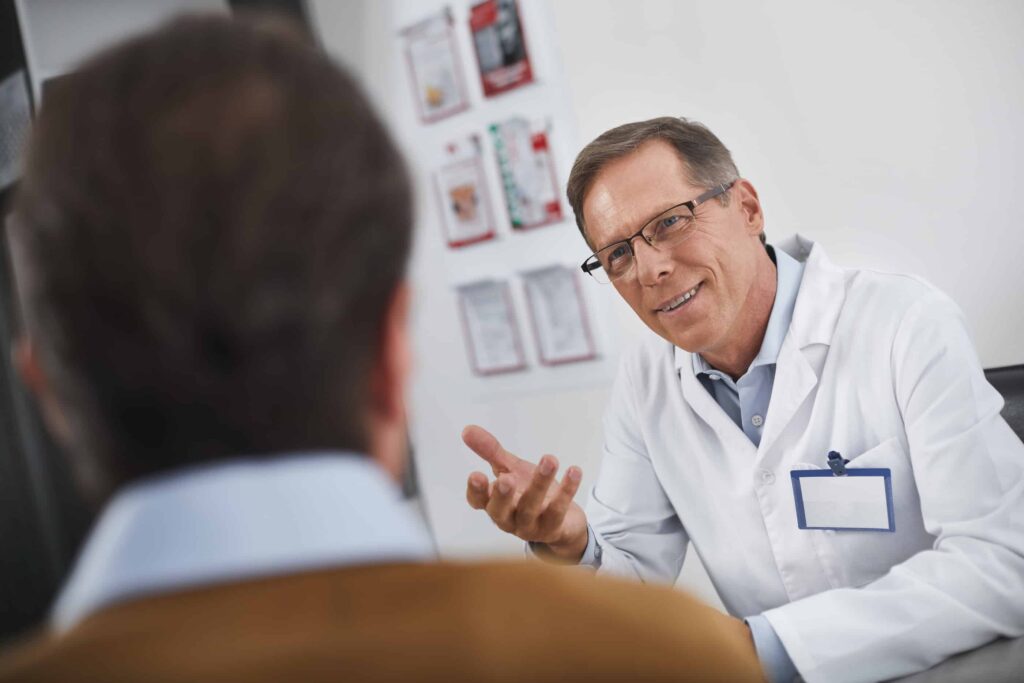 patient with mental health disorder and opioid use disorder discussing treatment with doctor