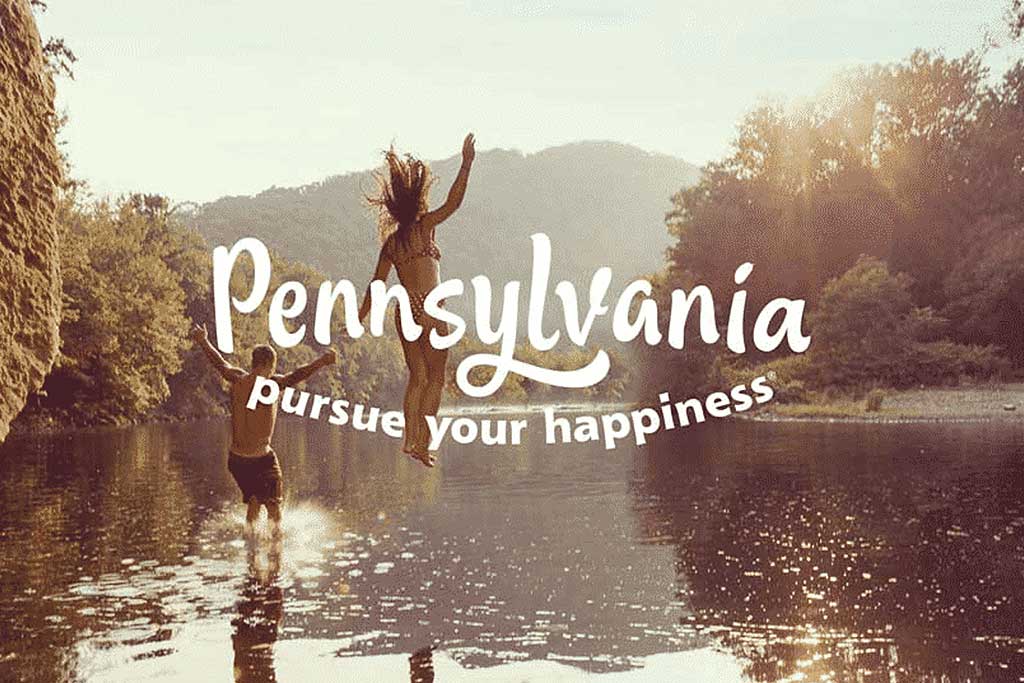 Pennsylvania pursue your happiness written on top image of man and women falling into a pond feet first at sunset. Representing Rapid Detox in Pennsylvania page