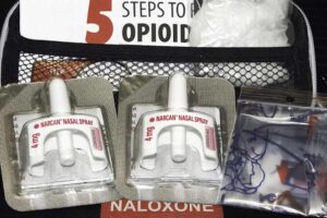 Photo of Naloxone nasal delivery method of Narcan. It is now available over the counter to help combat opioid crisis and reverse the effects of opioid overdose.
